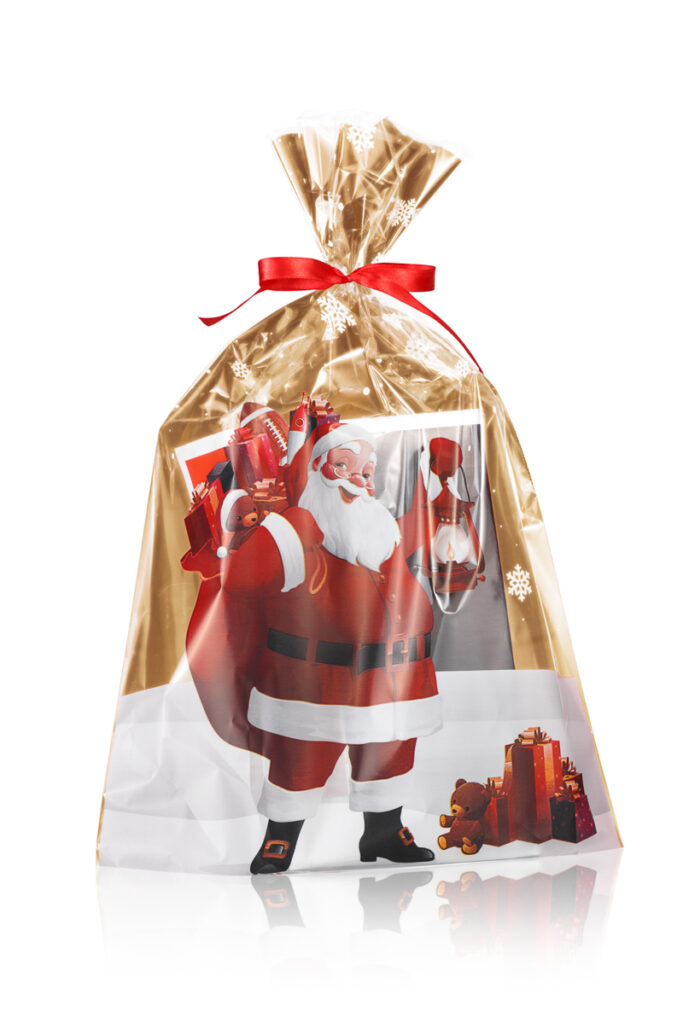 Zdjęcia do e-commerce: Złoty woreczek foliowy z nadrukiem Mikołaja – opakowanie prezentowe